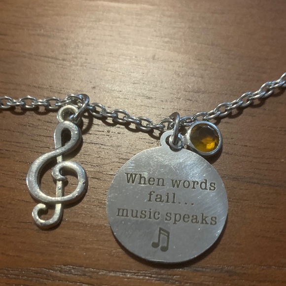 Silver Musical Note Pendant Necklace - Picture 2 of 2